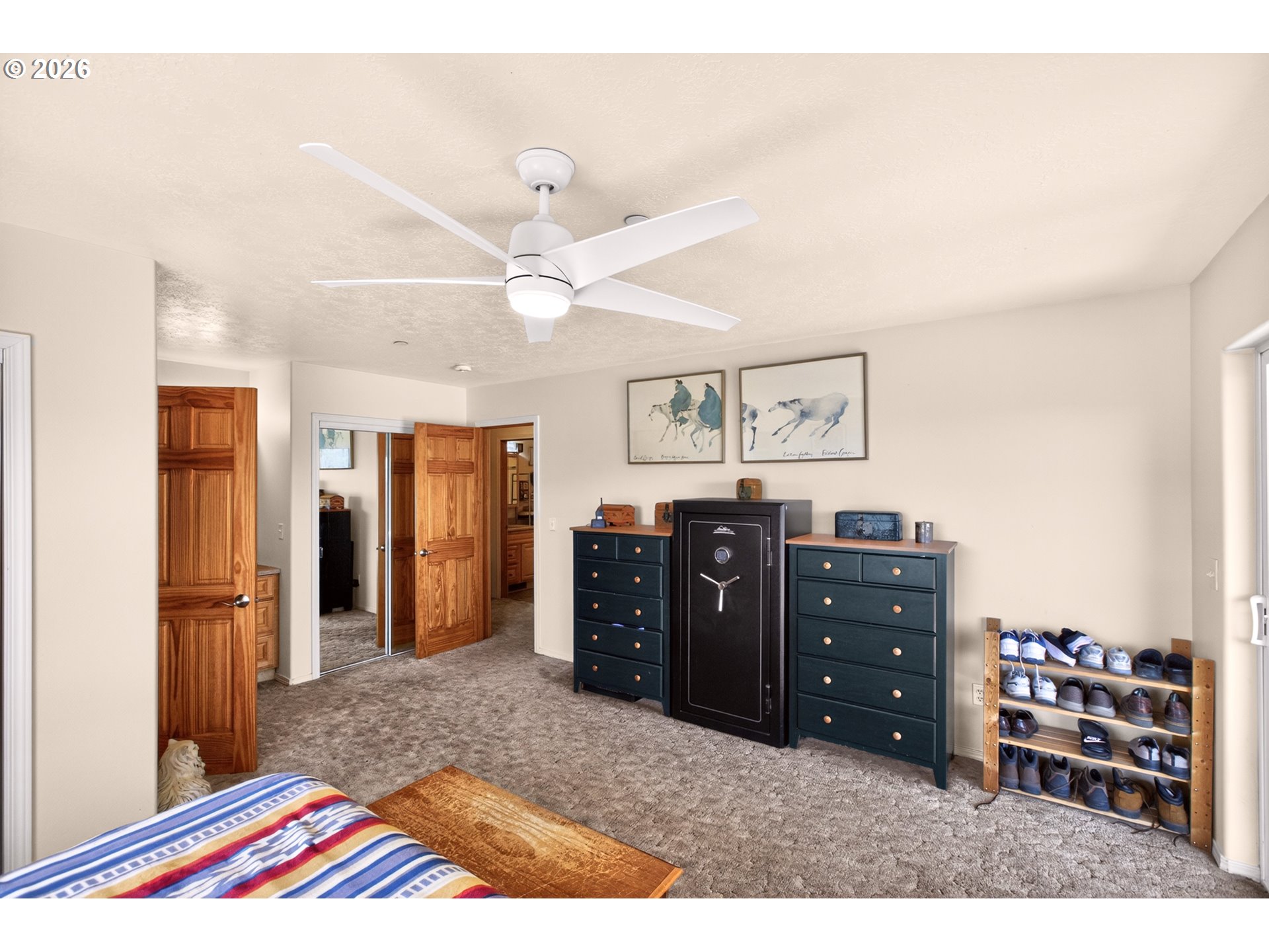 4377 Browns Creek Road The Dalles, OR 97058 - Photo 14 of 38 a bedroom with a bed and a dresser