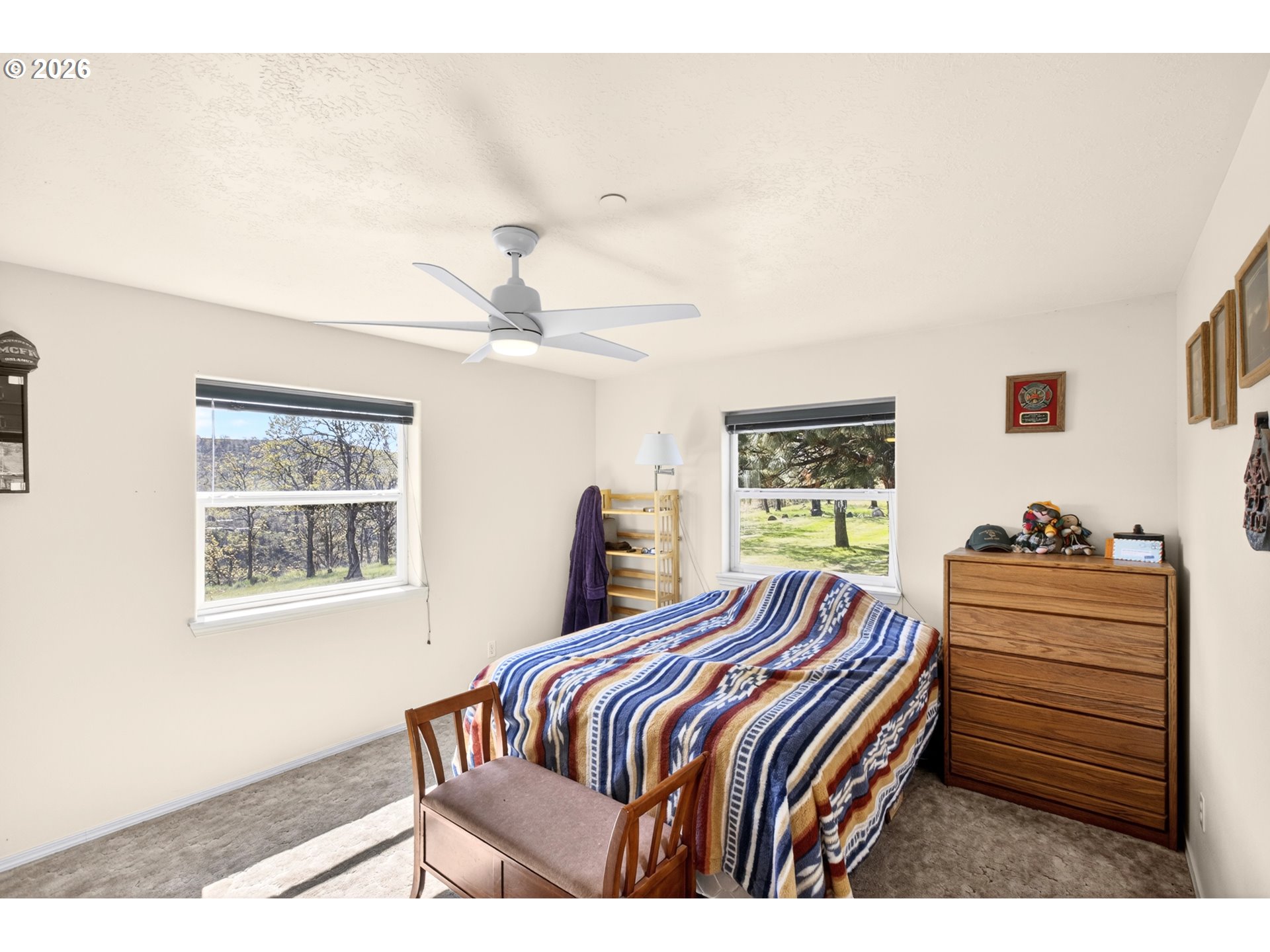 4377 Browns Creek Road The Dalles, OR 97058 - Photo 20 of 38 a bedroom with a bed and a window