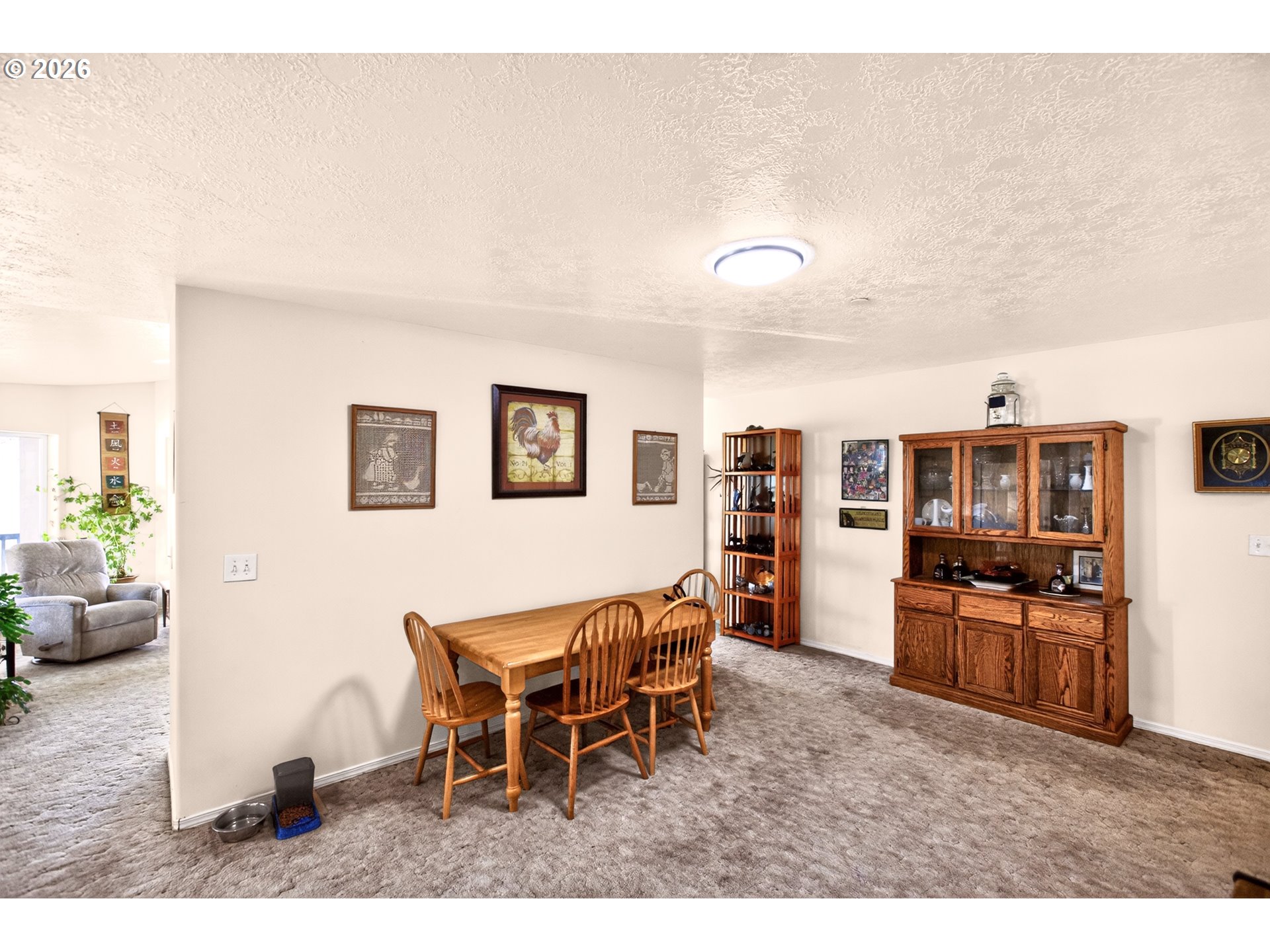 4377 Browns Creek Road The Dalles, OR 97058 - Photo 10 of 38 a living room with furniture a dining table and chairs with wooden floor