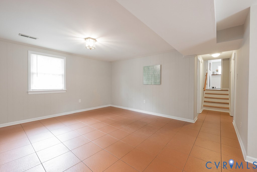 6901 Manning Road Chesterfield, VA 23832 - Photo 38 of 57 Spacious room featuring square terracotta-toned fl