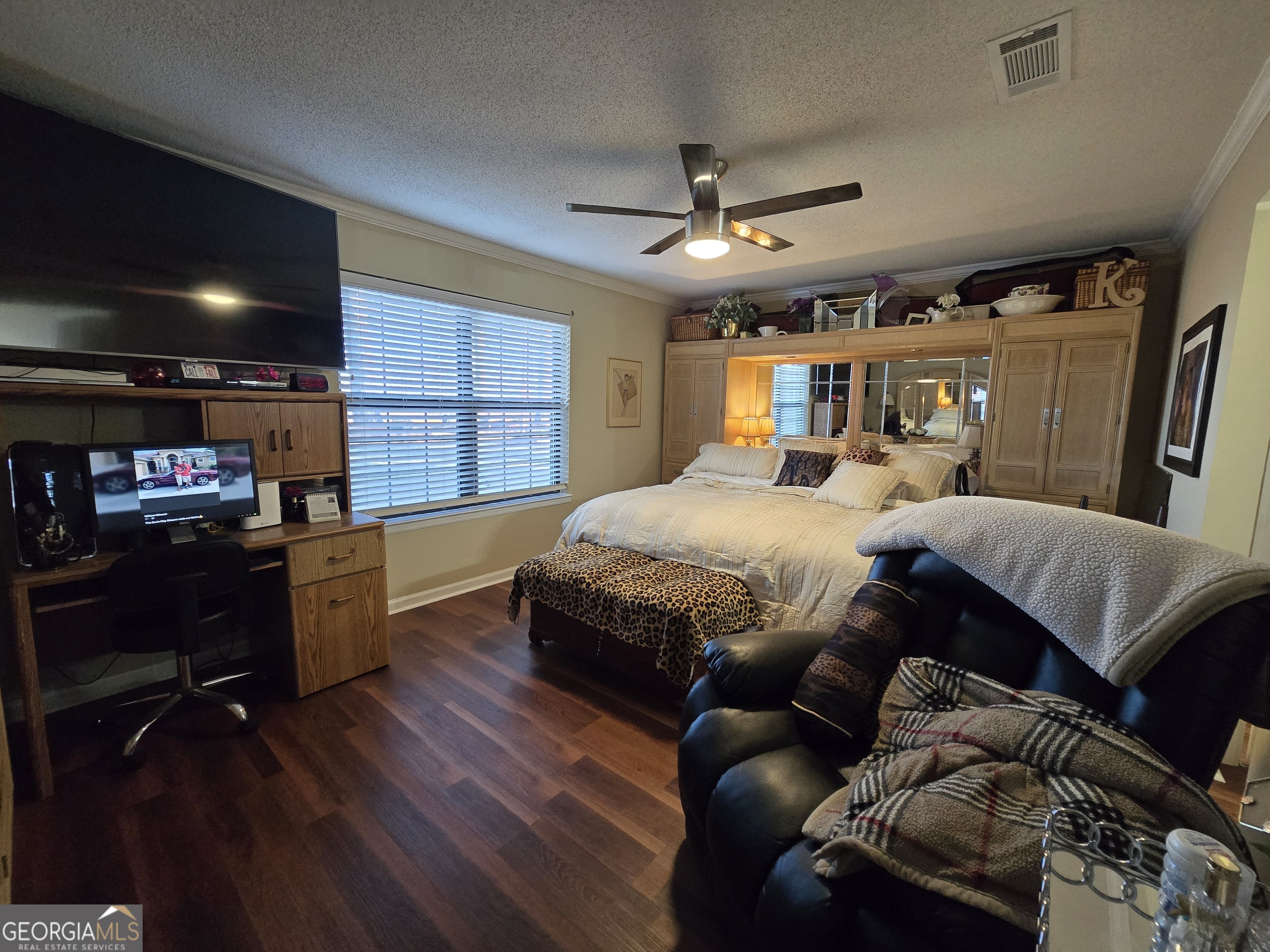 479 Mitchell Loop Bluffton, GA 39824 - Photo 22 of 51 a bedroom with a bed window and a television