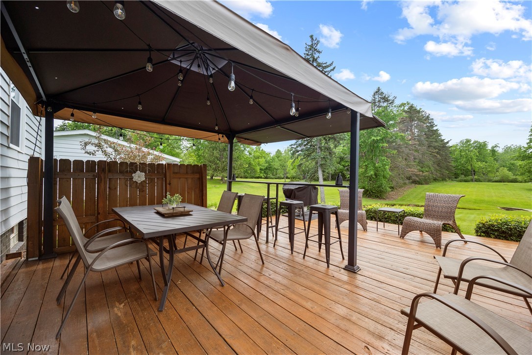 11492 Ridge Road North Royalton, OH 44133 - Photo 31 of 32 Expansive wood-finish deck featuring a permanent gazebo with integrated string lighting