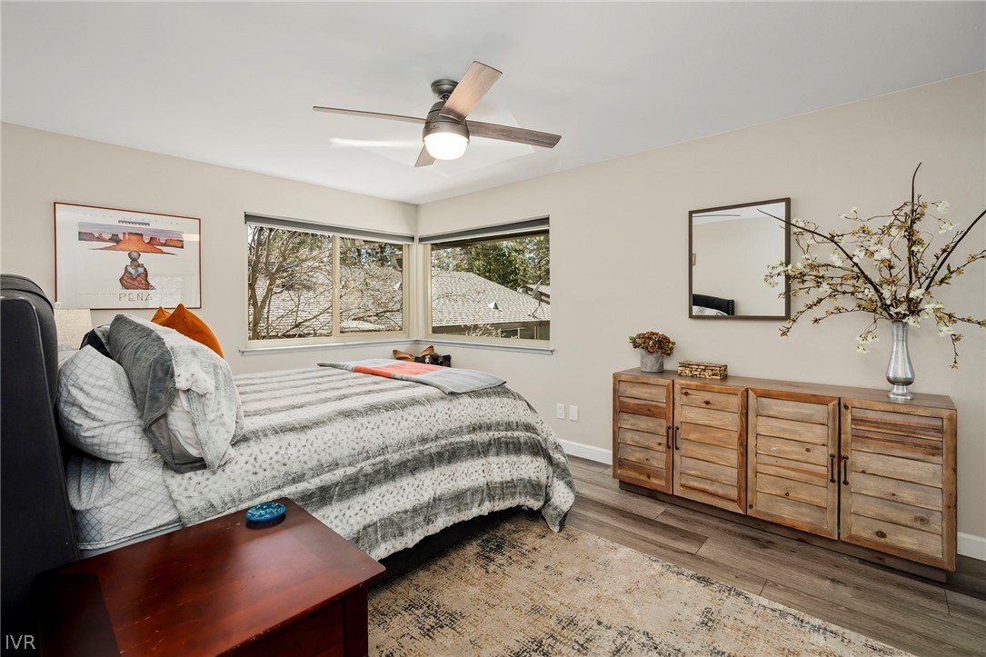 806 Oriole Way, Unit 16 Incline Village, NV 89451 - Photo 11 of 17 a bedroom with a bed and a dresser