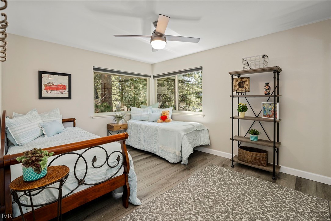 806 Oriole Way, Unit 16 Incline Village, NV 89451 - Photo 13 of 17 a bedroom with furniture and a window