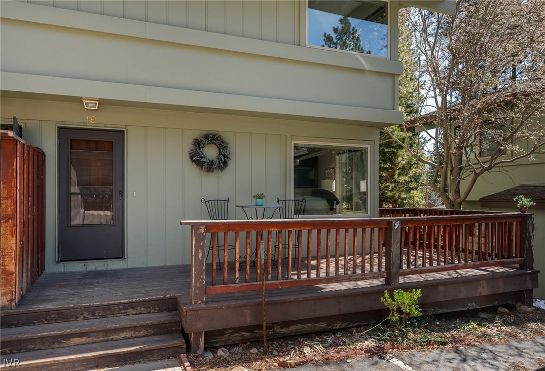 806 Oriole Way, Unit 16 Incline Village, NV 89451 - Photo 16 of 17 a view of a wooden deck with a bench