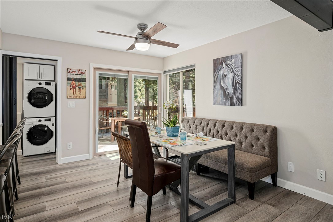 806 Oriole Way, Unit 16 Incline Village, NV 89451 - Photo 8 of 17 a view of a dining room with furniture and wooden floor