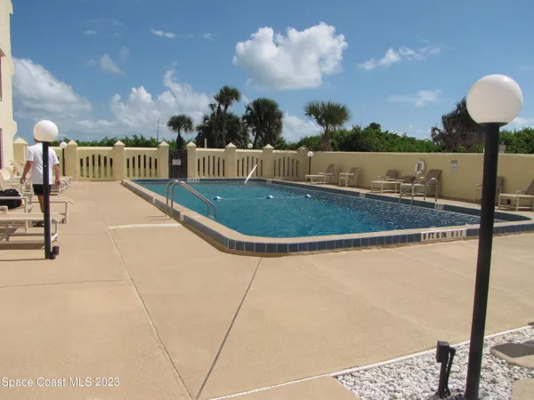 a view of a lake from a balcony