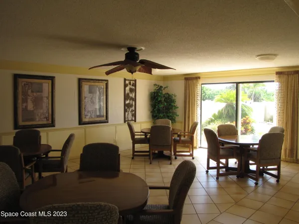 a view of a car in front of a building