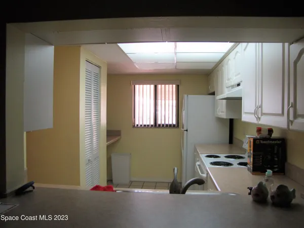 a room with gym equipment and a window