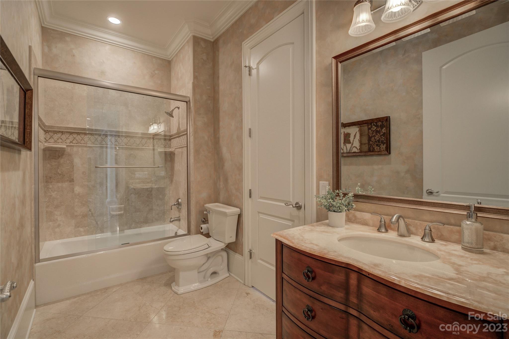 4269 River Oaks Road Clover, SC 29710 - Photo 26 of 48 a bathroom with a granite countertop sink toilet and shower