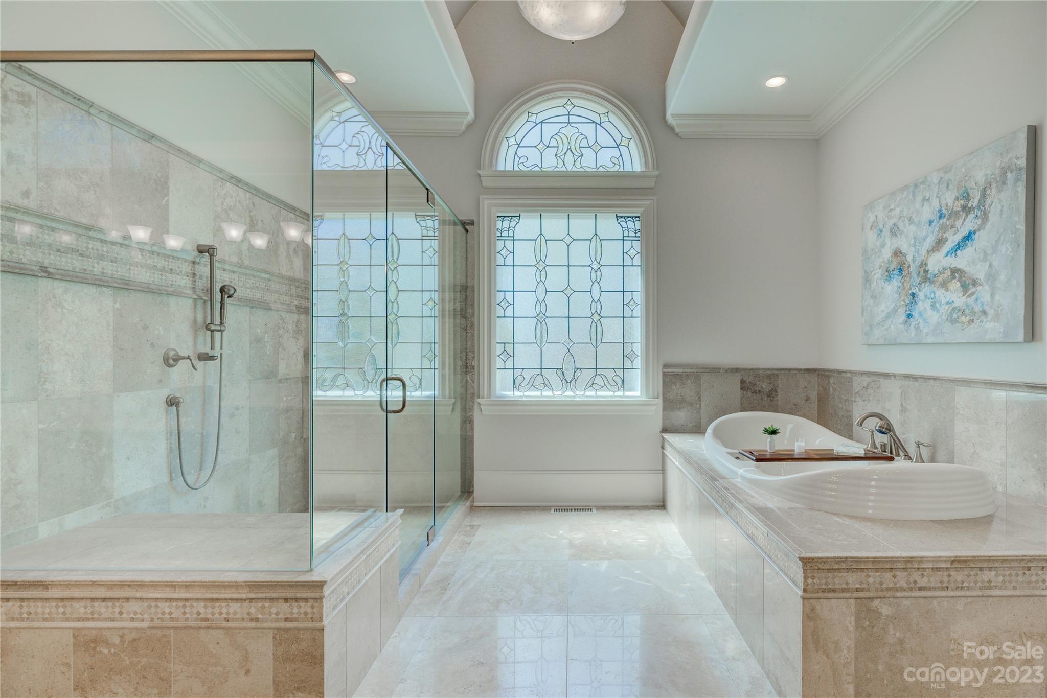 4269 River Oaks Road Clover, SC 29710 - Photo 28 of 48 a bathroom with a tub sink and mirror