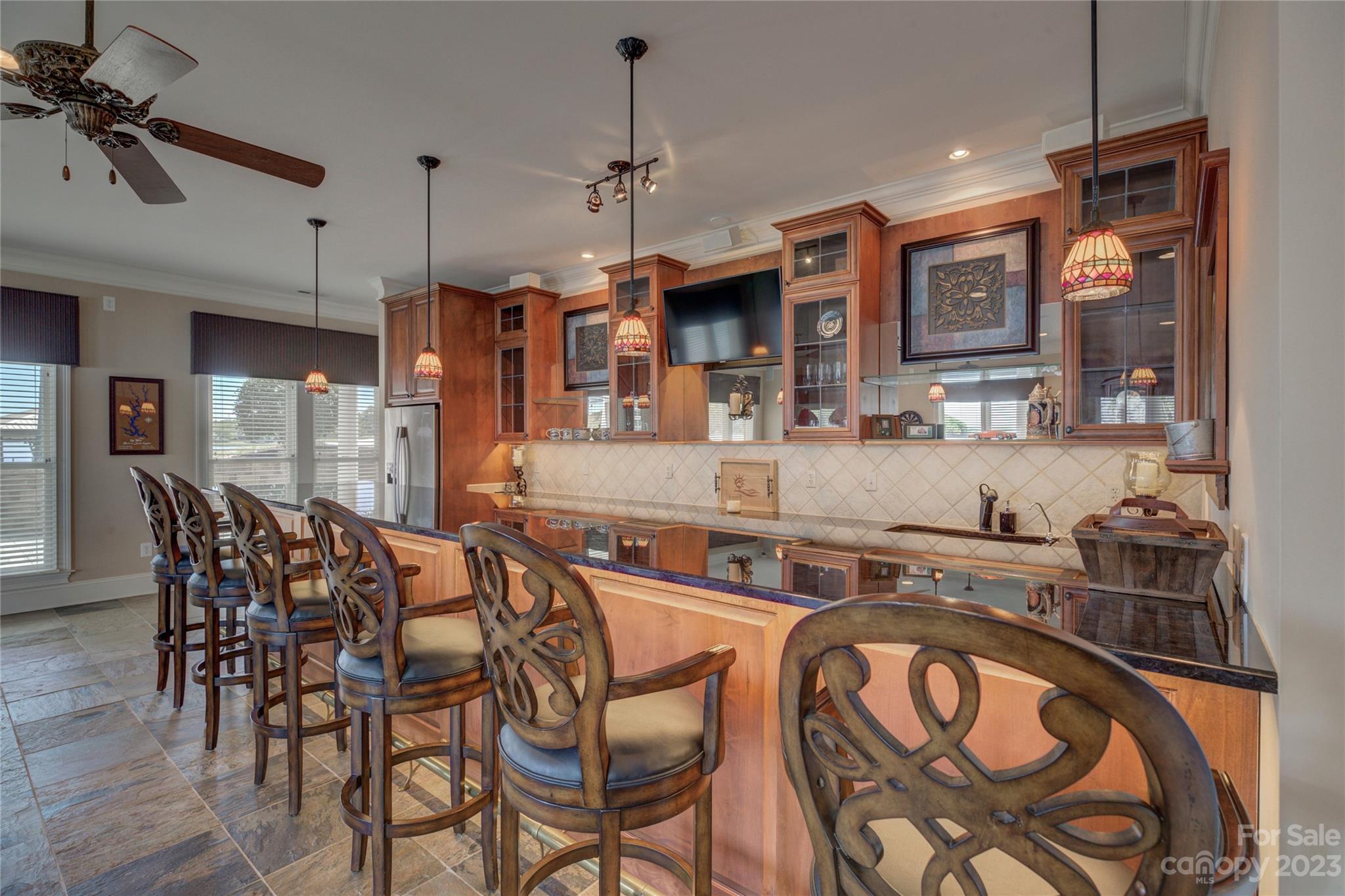 4269 River Oaks Road Clover, SC 29710 - Photo 42 of 48 a view of a dining room with furniture and a chandelier