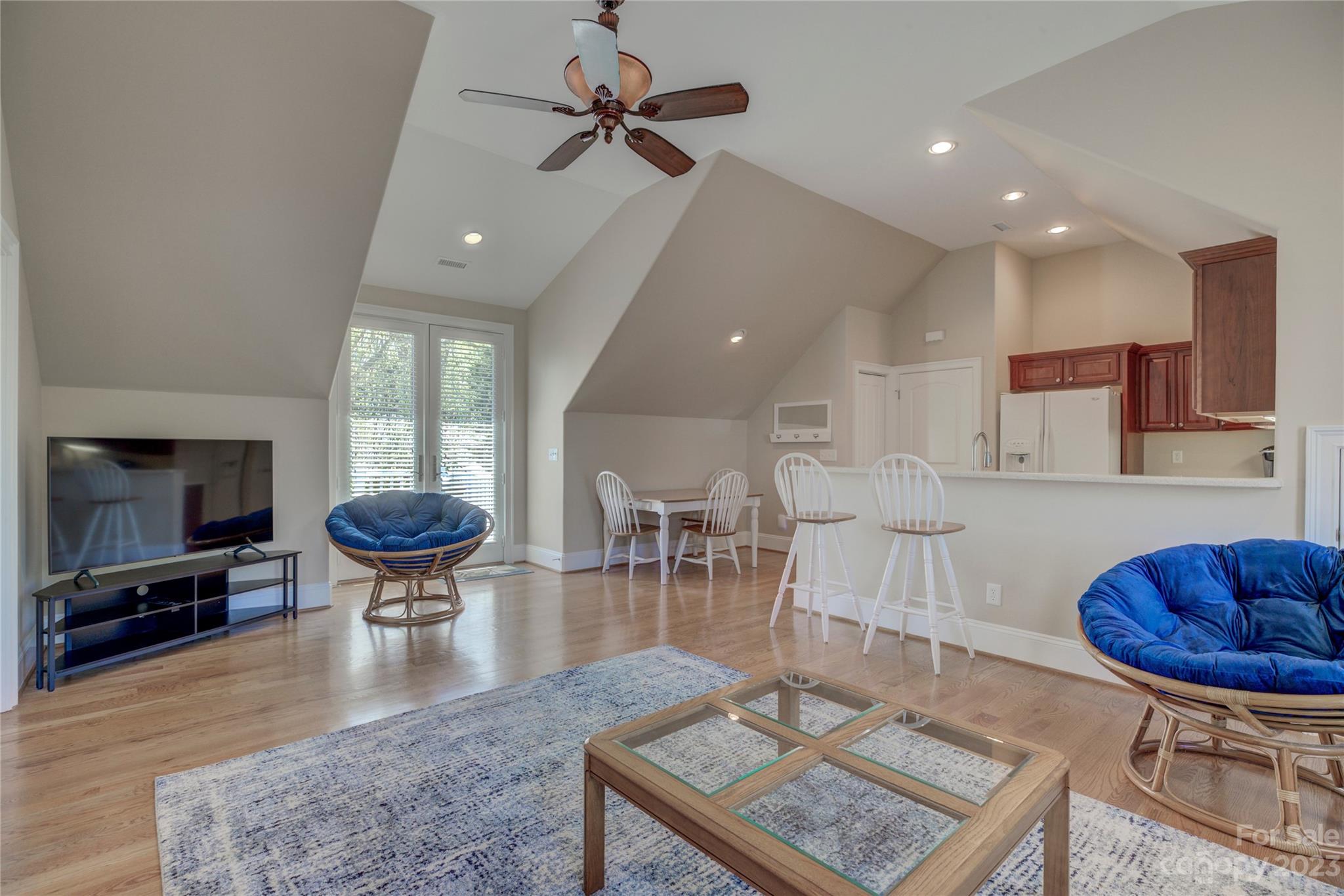 4269 River Oaks Road Clover, SC 29710 - Photo 48 of 48 a living room with furniture a rug and a chandelier