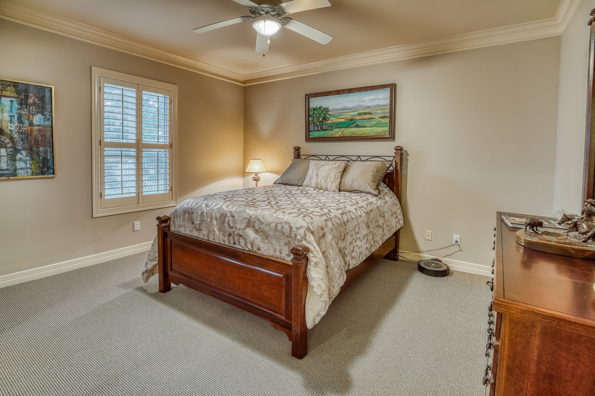 2204 Carter Road Bellville, TX 77418 - Photo 19 of 30 a bed sitting in a bedroom next to a window