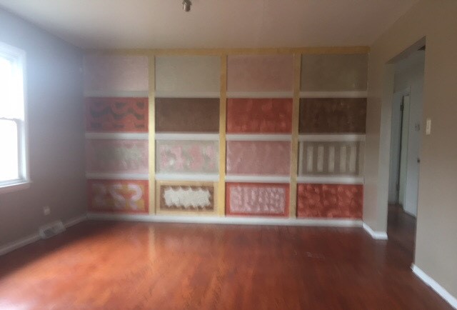725 East 152nd Street Phoenix, IL 60426 - Photo 3 of 13 a view of an empty room with a window