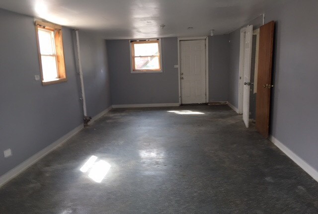 725 East 152nd Street Phoenix, IL 60426 - Photo 10 of 13 an empty room with windows and closet