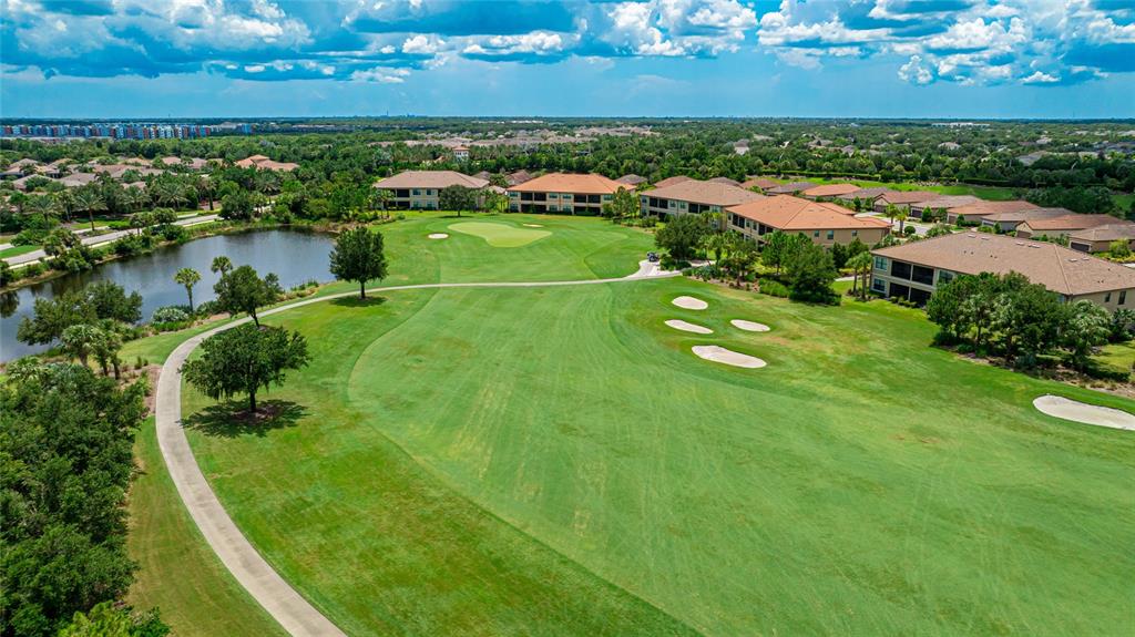 13719 Messina Loop, Unit 101 Lakewood Ranch, FL 34211 - Photo 46 of 77 an aerial view of tennis court