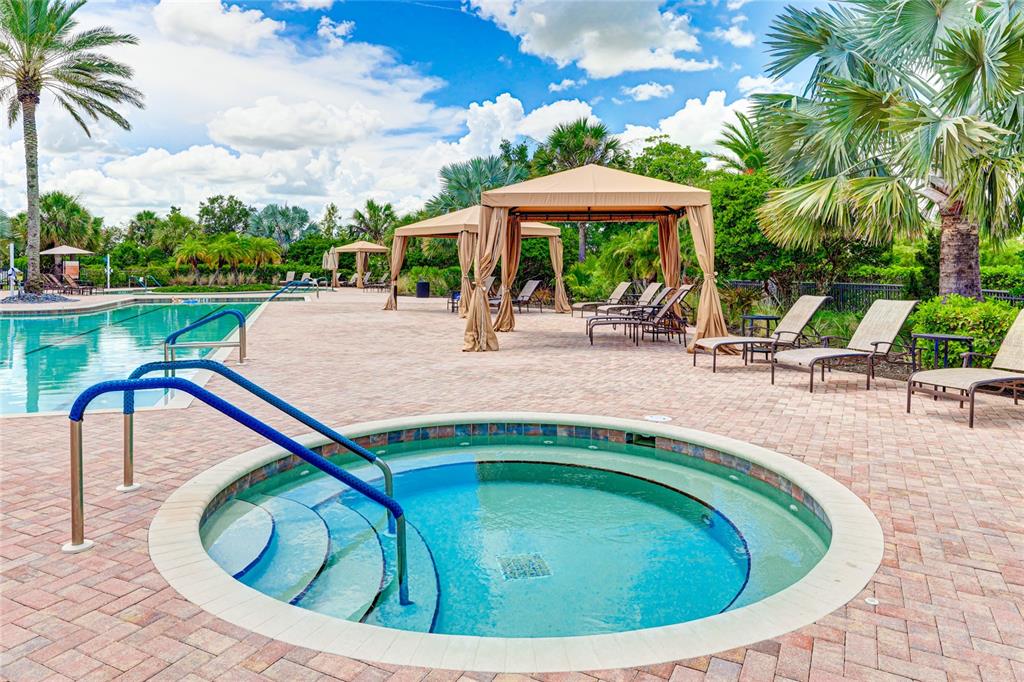 13719 Messina Loop, Unit 101 Lakewood Ranch, FL 34211 - Photo 73 of 77 a view of a swimming pool with a patio