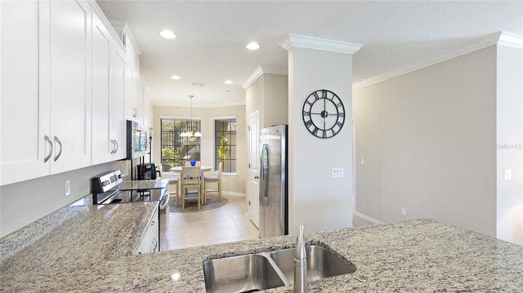 13719 Messina Loop, Unit 101 Lakewood Ranch, FL 34211 - Photo 8 of 77 a living room with furniture
