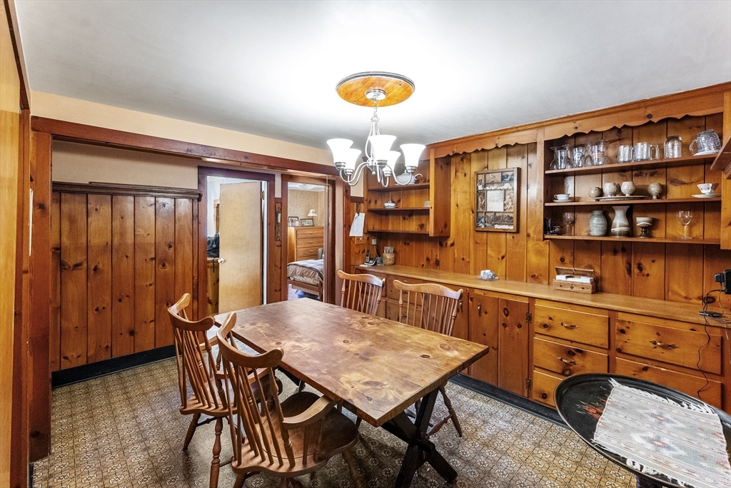 115 Kennedy Road Stoughton, MA 02072 - Photo 8 of 42 a view of a dining room with furniture and window