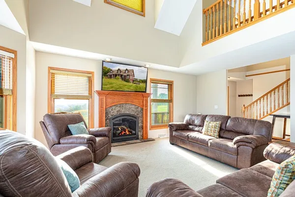 a bathroom with a sink a toilet and shower curtain