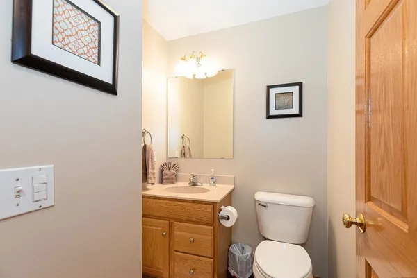 a view of a house with a yard patio and sitting area