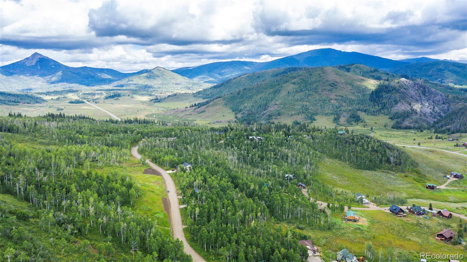 57730 Longfellow Way Clark, CO 80428 - Photo 4 of 9 a view of a city with mountains in the background