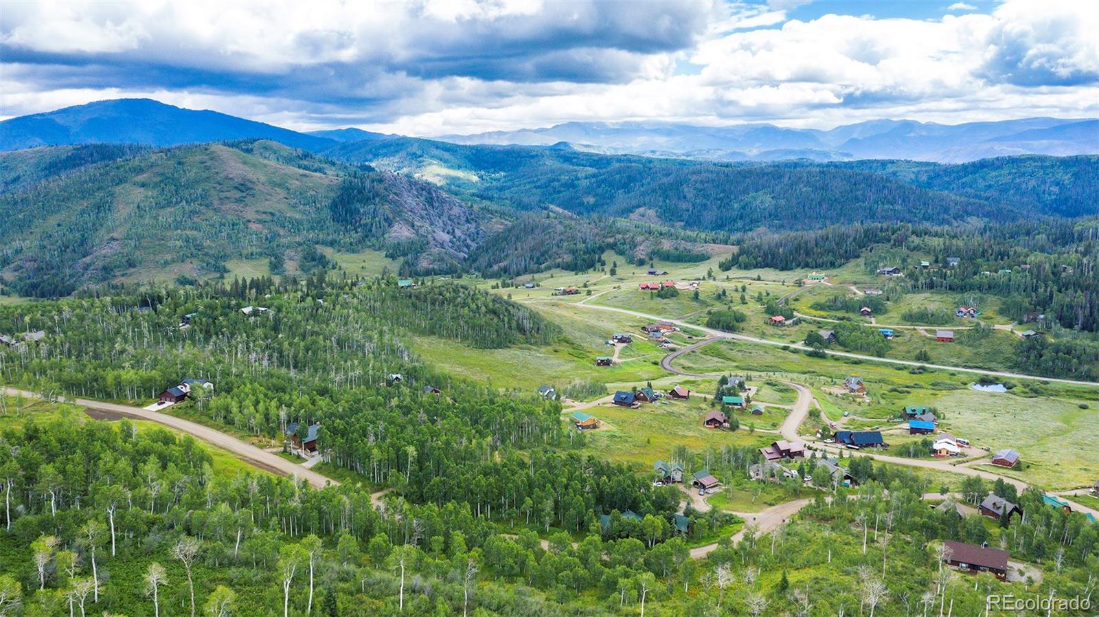 57730 Longfellow Way Clark, CO 80428 - Photo 7 of 9 a view of a city with lush green forest