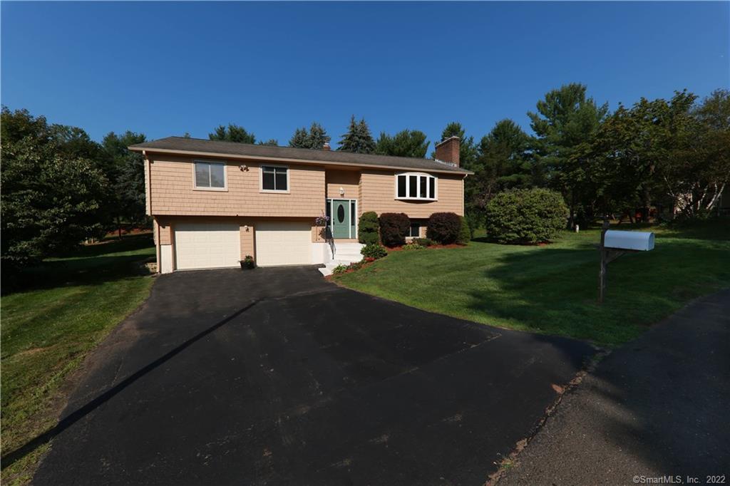 1 Yellow Wood Street Middletown, CT 06457 - Photo 1 of 1 a front view of a house with a yard