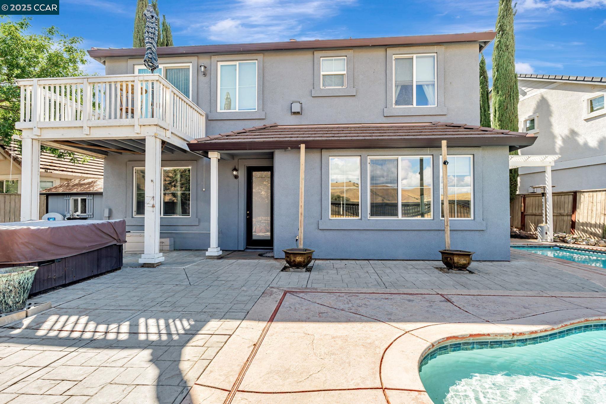 20640 Sarazen Place Patterson, CA 95363 - Photo 25 of 28 a front view of a house with a yard