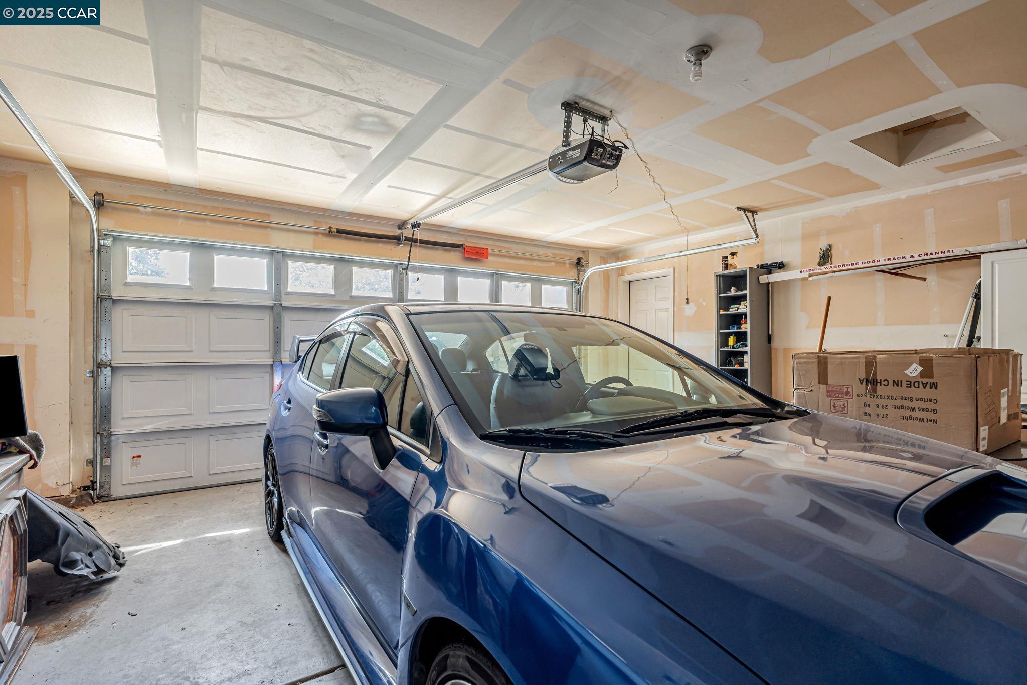 20640 Sarazen Place Patterson, CA 95363 - Photo 28 of 28 a view of parking garage