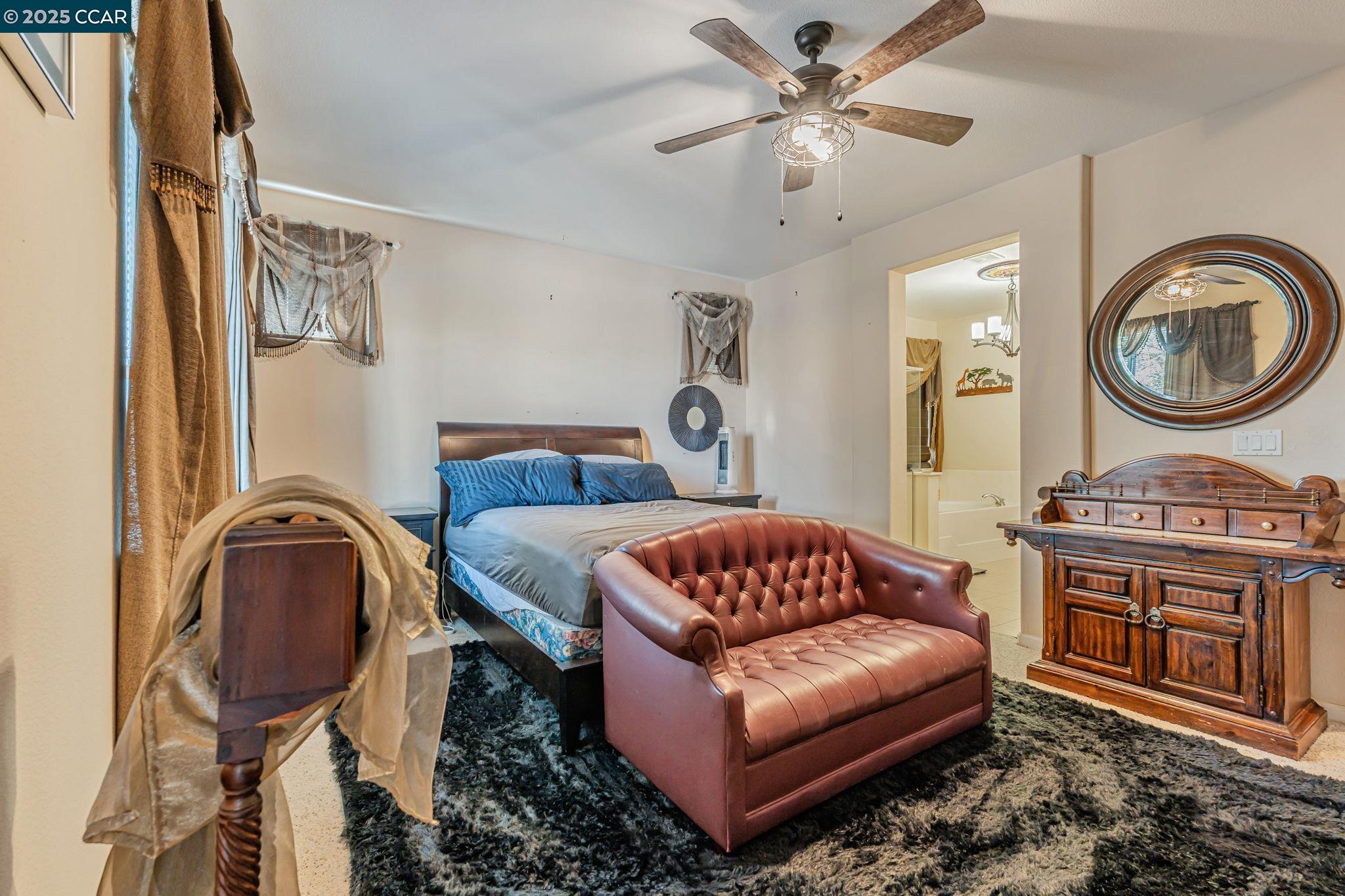 20640 Sarazen Place Patterson, CA 95363 - Photo 10 of 28 a living room with furniture