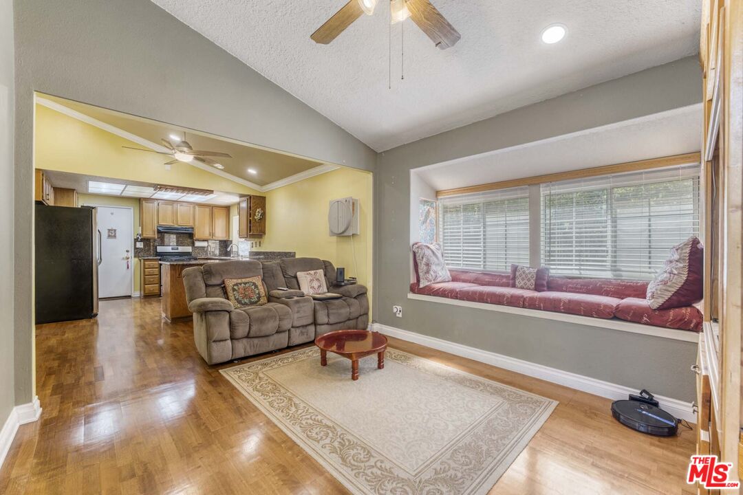28135 Royal Road Castaic, CA 91384 - Photo 15 of 37 a living room with furniture and a table