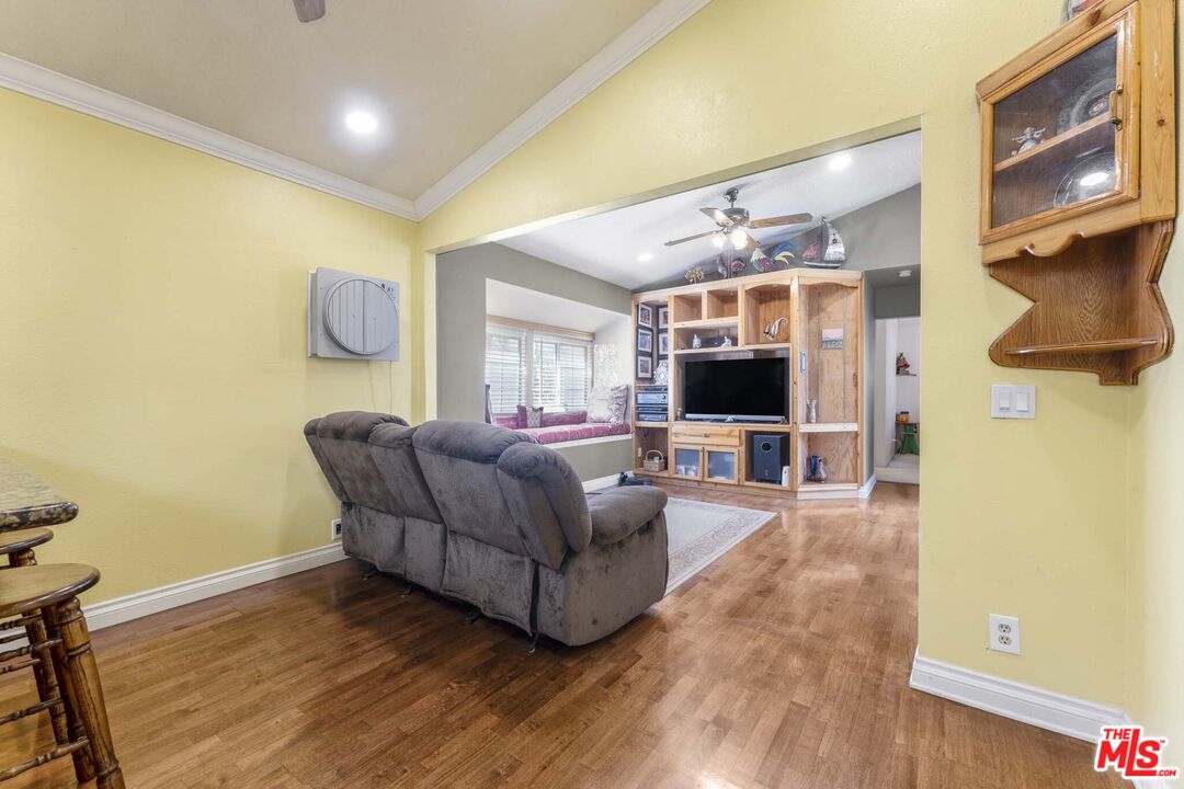 28135 Royal Road Castaic, CA 91384 - Photo 16 of 37 a living room with furniture and a flat screen tv