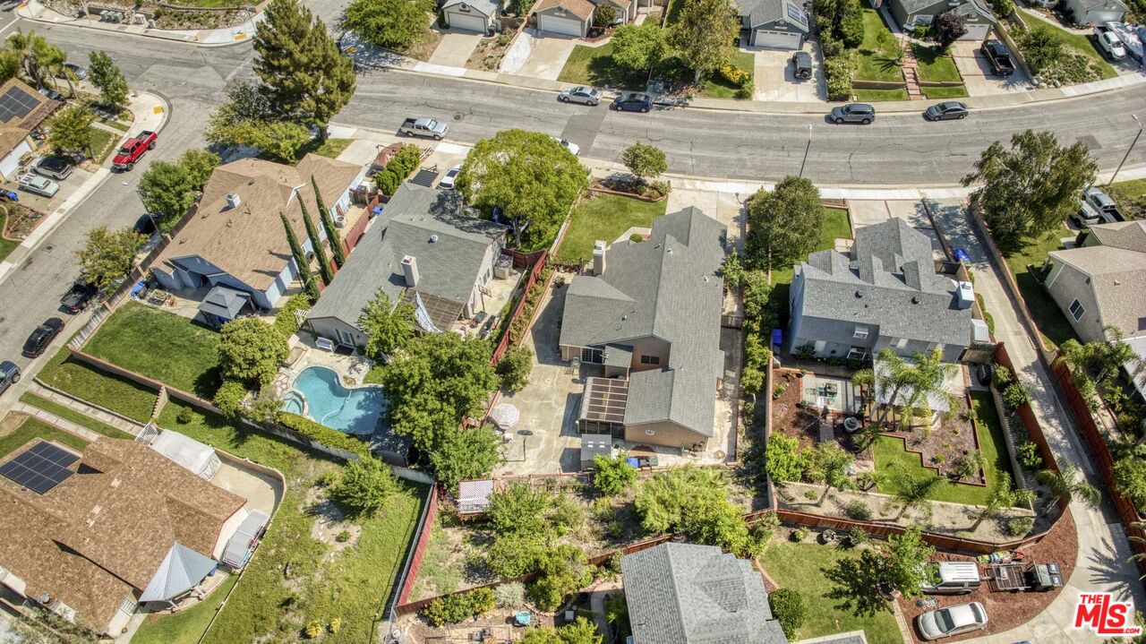 28135 Royal Road Castaic, CA 91384 - Photo 35 of 37 an aerial view of multiple houses with yard