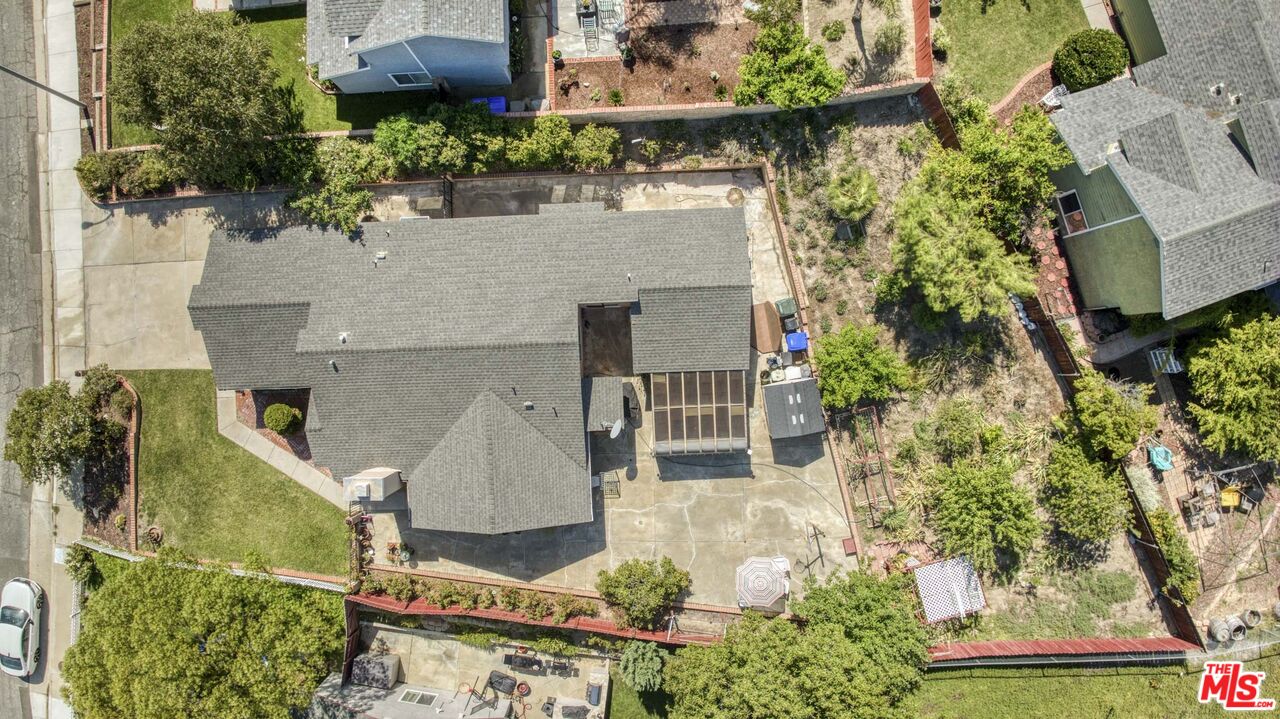 28135 Royal Road Castaic, CA 91384 - Photo 37 of 37 an aerial view of a house with a yard and potted plants