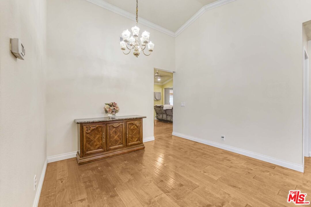 28135 Royal Road Castaic, CA 91384 - Photo 8 of 37 a view of livingroom with chandelier