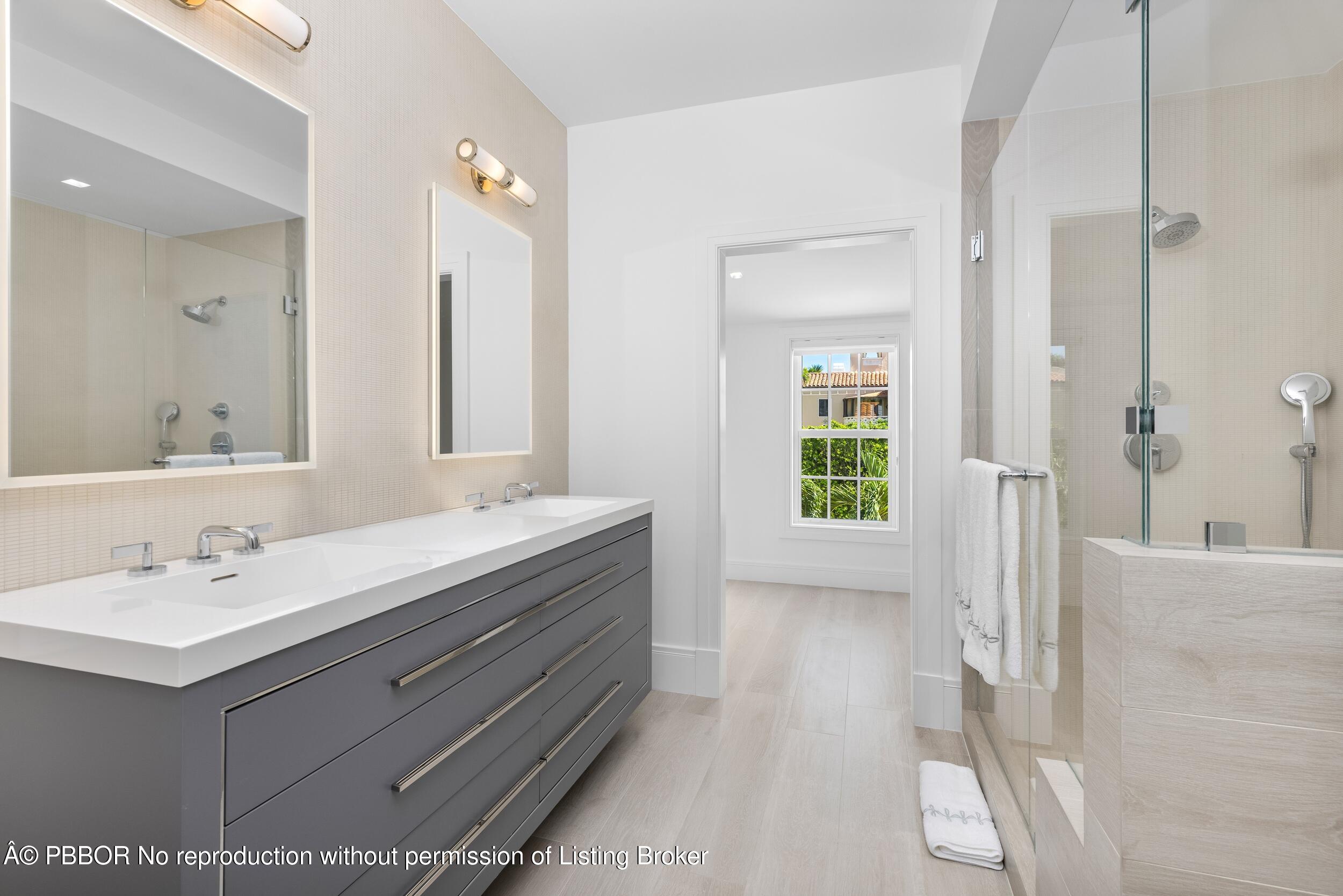 201 Banyan Road Palm Beach, FL 33480 - Photo 25 of 42 a bathroom with a double vanity sink mirror and double