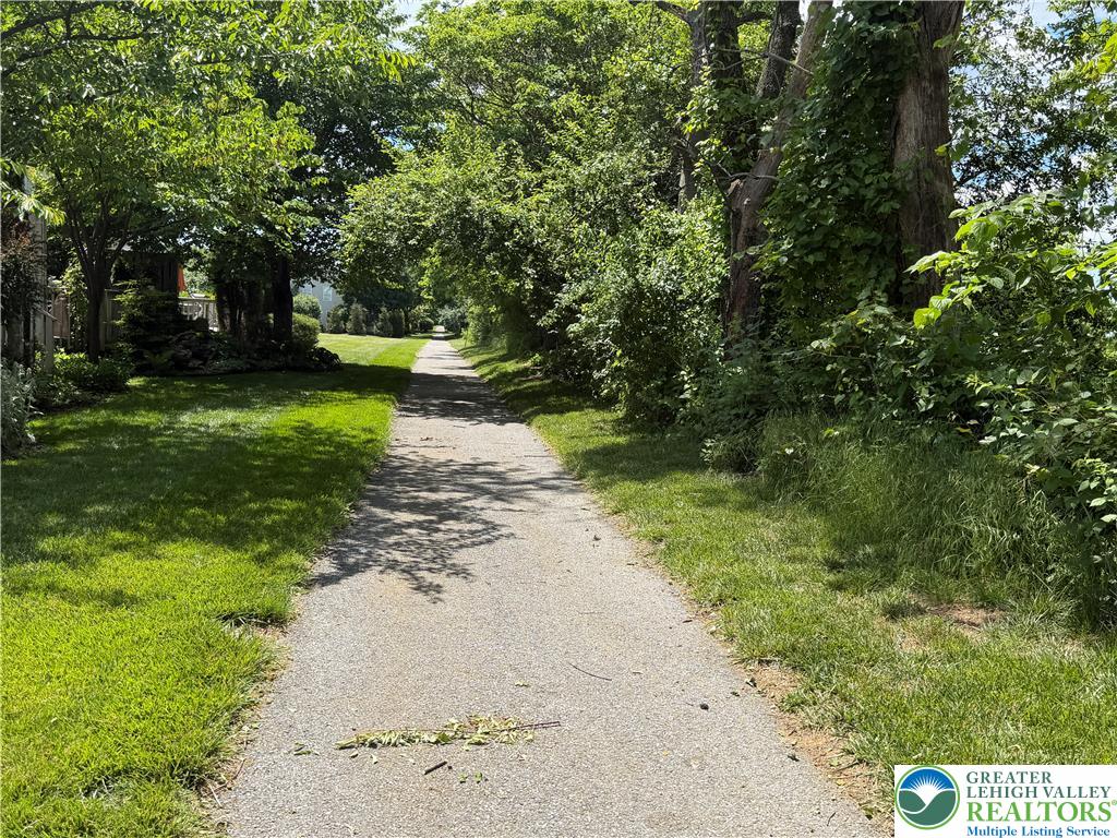 4157 Walter Road Bethlehem, PA 18020 - Photo 6 of 36 A winding pathway invites tranquil strolls through lush, verdant landscapes.