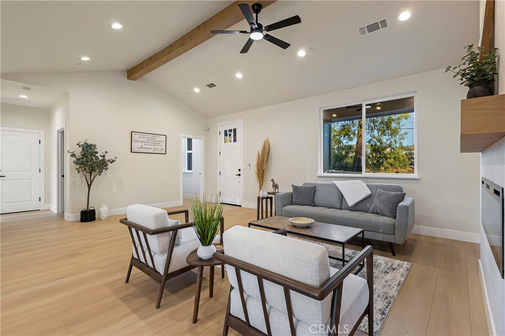 6185 Pentz Road Paradise, CA 95969 - Photo 13 of 53 a living room with furniture and a large window