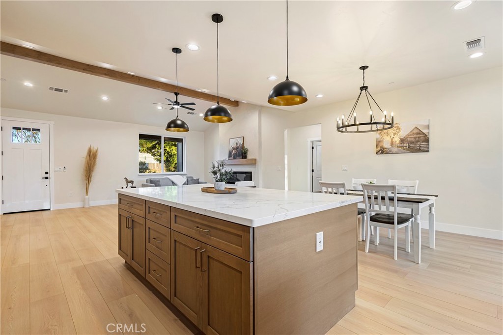 6185 Pentz Road Paradise, CA 95969 - Photo 19 of 53 a kitchen with a sink a counter space and wooden floor