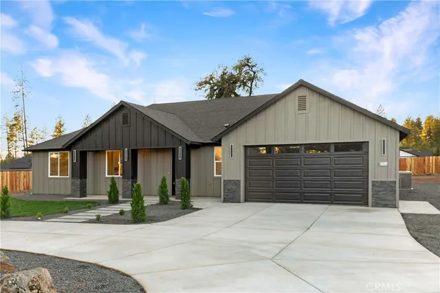 a front view of a house with a garage