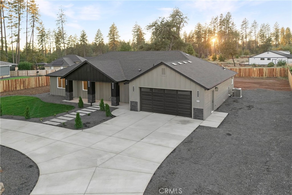 6185 Pentz Road Paradise, CA 95969 - Photo 3 of 53 a front view of a house with yard and green space