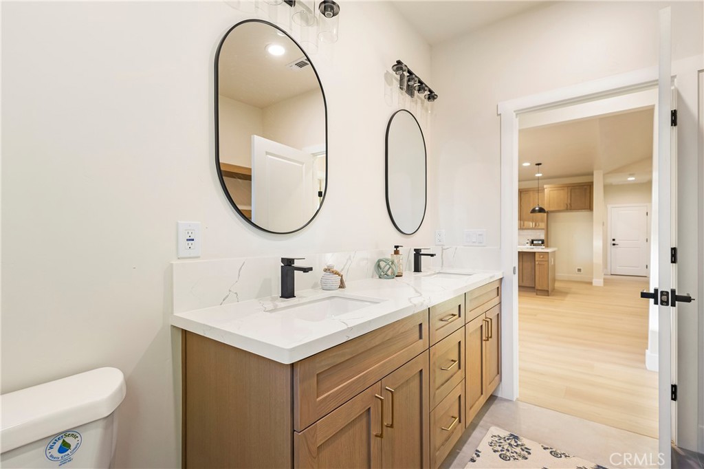 6185 Pentz Road Paradise, CA 95969 - Photo 31 of 53 a bathroom with a sink and a mirror