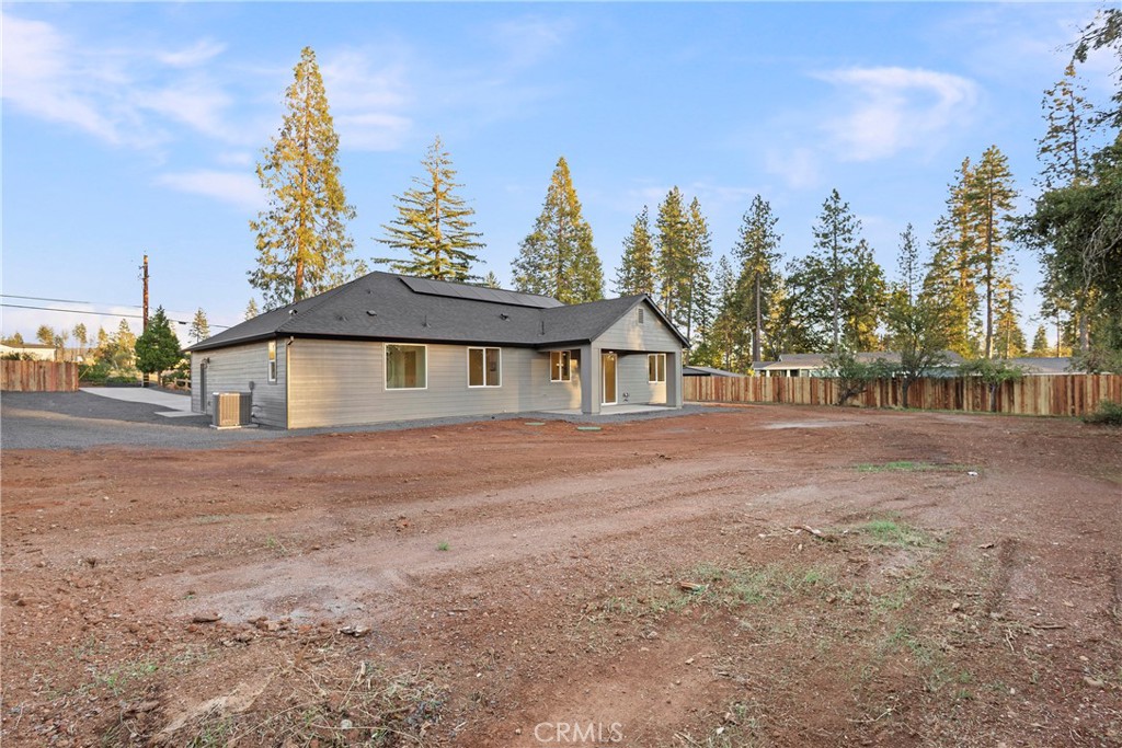 6185 Pentz Road Paradise, CA 95969 - Photo 38 of 53 a front view of a house with a yard and trees