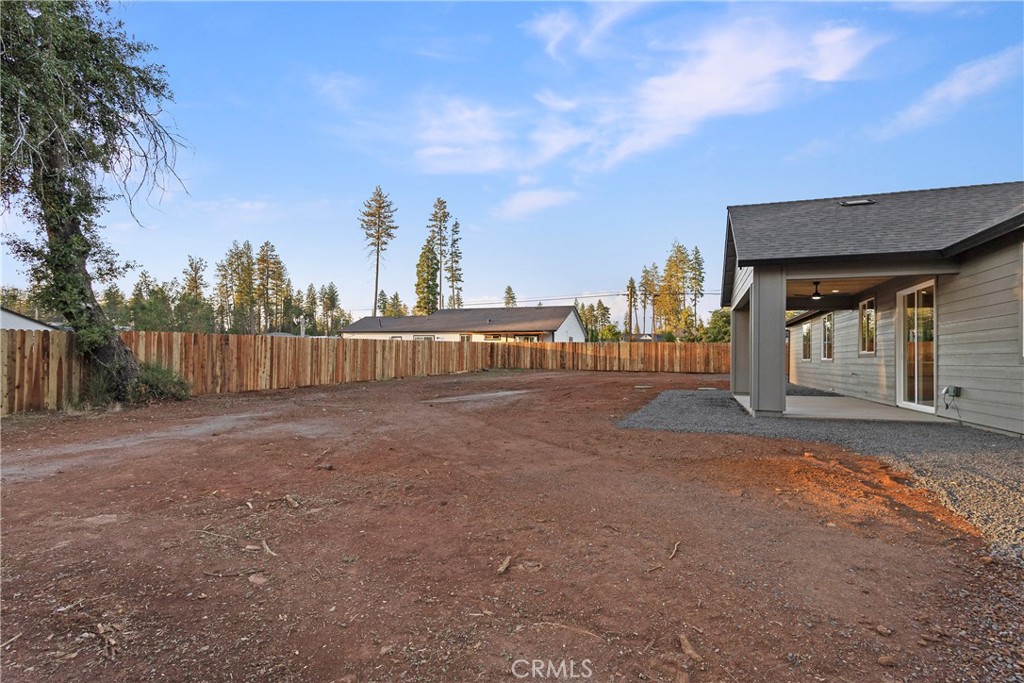 6185 Pentz Road Paradise, CA 95969 - Photo 41 of 53 a view of a house with backyard and trees