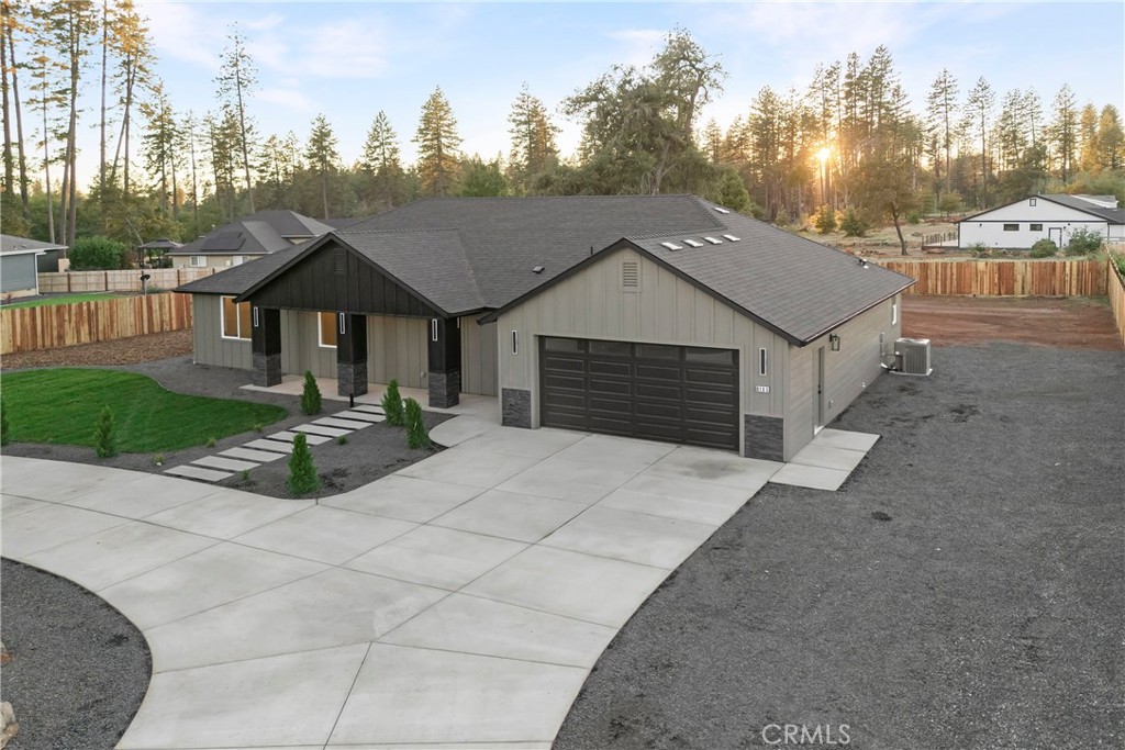 6185 Pentz Road Paradise, CA 95969 - Photo 43 of 53 a front view of a house with yard and green space