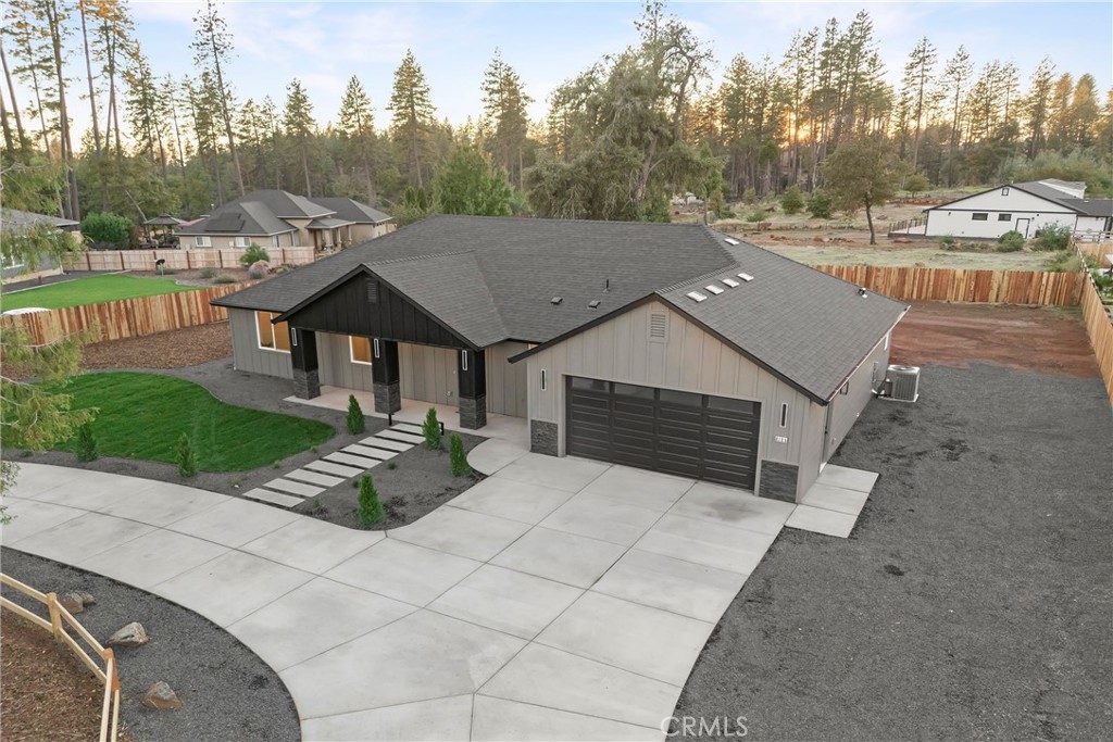 6185 Pentz Road Paradise, CA 95969 - Photo 44 of 53 a view of a house with a yard and sitting area