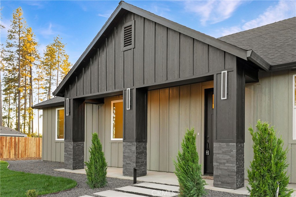 6185 Pentz Road Paradise, CA 95969 - Photo 10 of 53 a front view of a house with garden