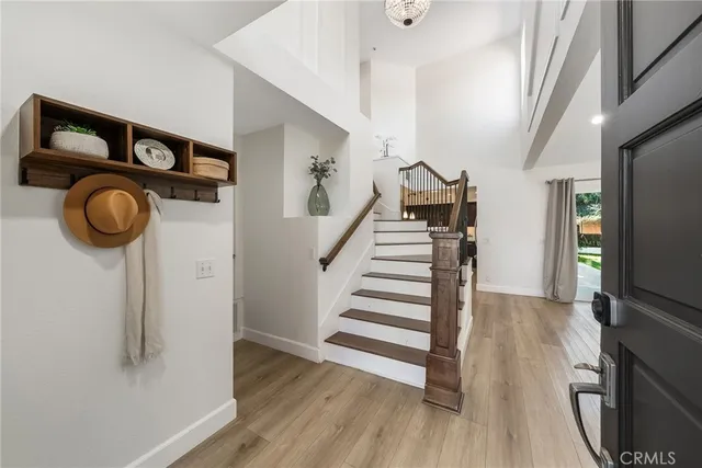 a view of entryway with wooden floor